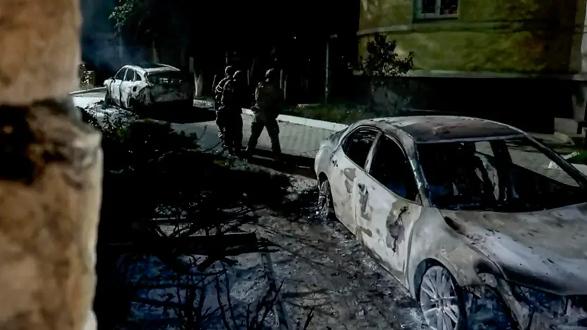 epa11433756 A handout still photo taken from a handout video provided by the Russian National Antiterrorism Committee shows Russian Federal Security service officers during counterterrorist operation in Derbent, Republic of Dagestan, Russia, early 24 June 2024. At least 15 Police officers and several other civilians were killed in attacks on two Orthodox churches, two synagogues and a traffic police station on 23 June, the head of Dagestan Sergei Melikov reported. The Dagestan National Anti-Terrorism Committee (NAC) has reported that five attackers were killed. The Committee is currently engaged in operational efforts to apprehend the remaining attackers and their aides. EPA/NATIONAL ANTITERRORISM COMMITTE / HANDOUT BEST QUALITY AVAILABLE HANDOUT EDITORIAL USE ONLY/NO SALES HANDOUT EDITORIAL USE ONLY/NO SALES