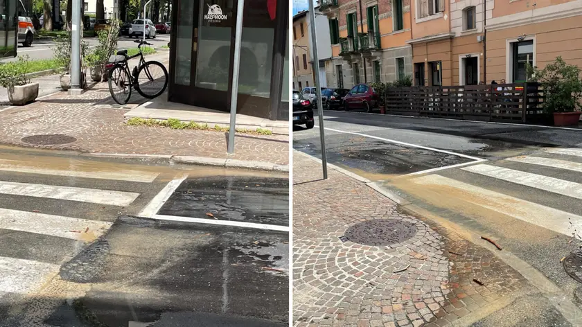 L’acqua uscita in via Buttrio a causa della perdita del tubo (Foto Petrussi)