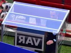 American referee Mark Geiger checks the VAR screen during the Russia 2018 World Cup Group F football match between South Korea and Germany at the Kazan Arena in Kazan on June 27, 2018. / AFP PHOTO / Luis Acosta / RESTRICTED TO EDITORIAL USE - NO MOBILE PUSH ALERTS/DOWNLOADS