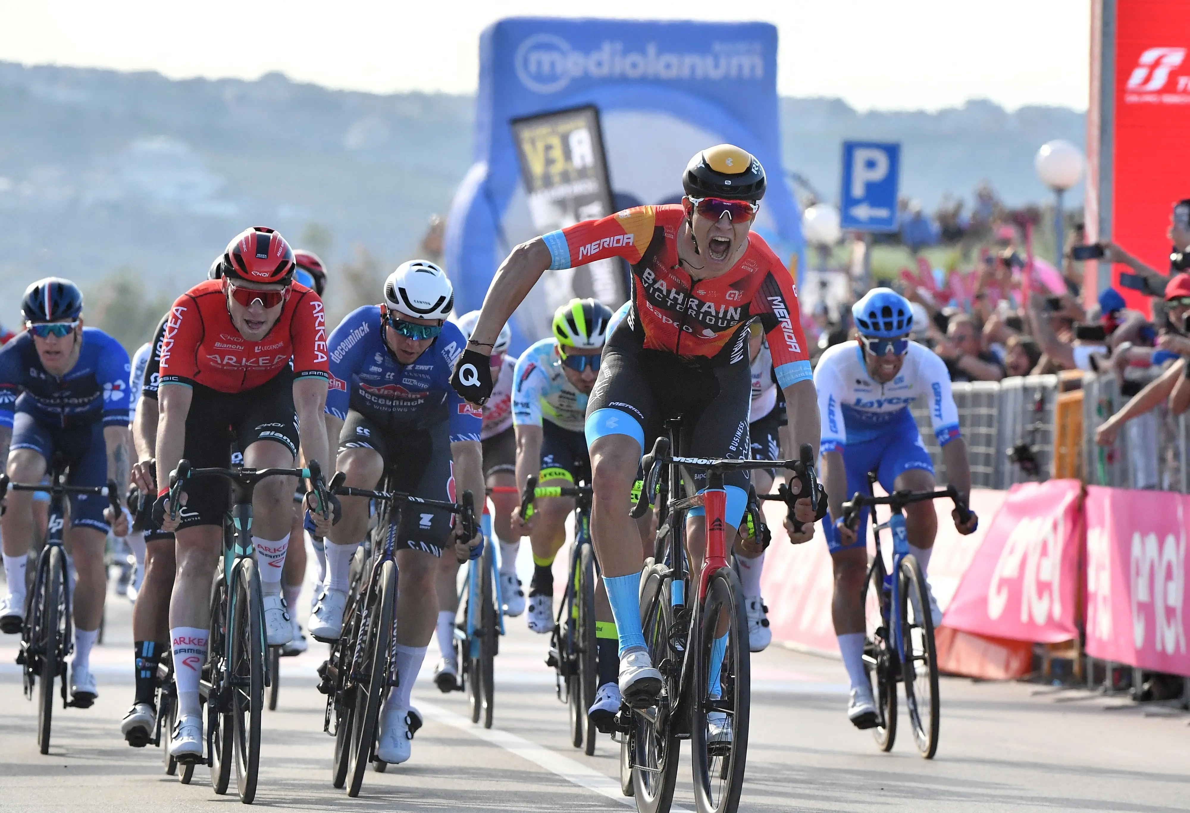Cycling - Giro d'Italia - Stage 2 - Teramo to San Salvo - Italy - May 7, 2023 Bahrain – Victorious' Jonathan Milan celebrates winning stage 2 REUTERS/Jennifer Lorenzini