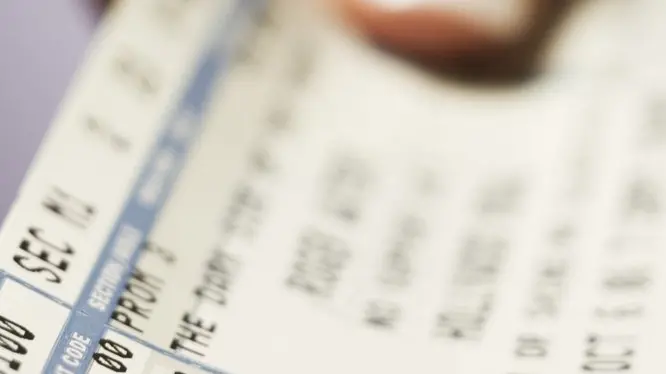 Woman giving tickets