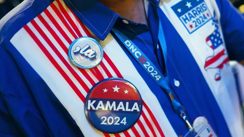 epa11558616 A delegate arrives during the third night of the Democratic National Convention (DNC) at the United Center in Chicago, Illinois, USA, 21 August 2024. The 2024 Democratic National Convention is being held from 19 to 22 August 2024, during which delegates of the United States' Democratic Party will vote on the party's platform and ceremonially vote for the party's nominee for president, Vice President Kamala Harris, and for vice president, Governor Tim Walz of Minnesota, for the upcoming presidential election. EPA/WILL OLIVER