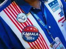 epa11558616 A delegate arrives during the third night of the Democratic National Convention (DNC) at the United Center in Chicago, Illinois, USA, 21 August 2024. The 2024 Democratic National Convention is being held from 19 to 22 August 2024, during which delegates of the United States' Democratic Party will vote on the party's platform and ceremonially vote for the party's nominee for president, Vice President Kamala Harris, and for vice president, Governor Tim Walz of Minnesota, for the upcoming presidential election. EPA/WILL OLIVER