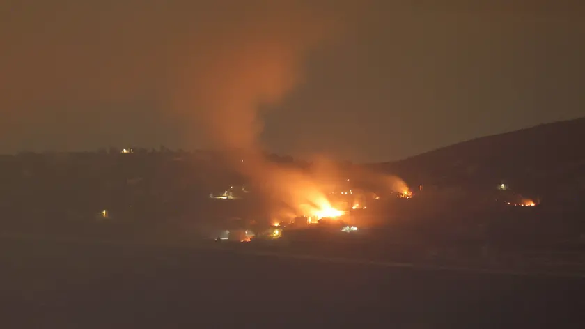 epa11634415 Israeli artillery shells hit areas near villages in southern Lebanon along the border with Israel, as seen from the Upper Galilee, northern Israel, 30 September 2024. Israel's military stated that it has been 'strengthening defense' along the contact line in the country's northern border as it was preparing for the 'next phases of combat'. The Israel Defense Forces (IDF) said they 'will continue to strike, harm, and degrade' Hezbollah's military in Lebanon. EPA/ATEF SAFADI