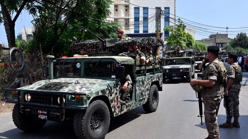 epa11390896 Lebanese special forces patrol on a road that leads the US Embassy in Awkar, a northern suburb of Beirut, Lebanon, 05 June 2024. According to the Lebanese Army, the US Embassy in Lebanon, located in the Awkar area, was targeted by gunfire from an individual holding Syrian nationality. Army personnel deployed in the area promptly responded to the source of the gunfire, resulting in the injury and subsequent arrest of the perpetrator, who was then transferred to a hospital for treatment. EPA/WAEL HAMZEH