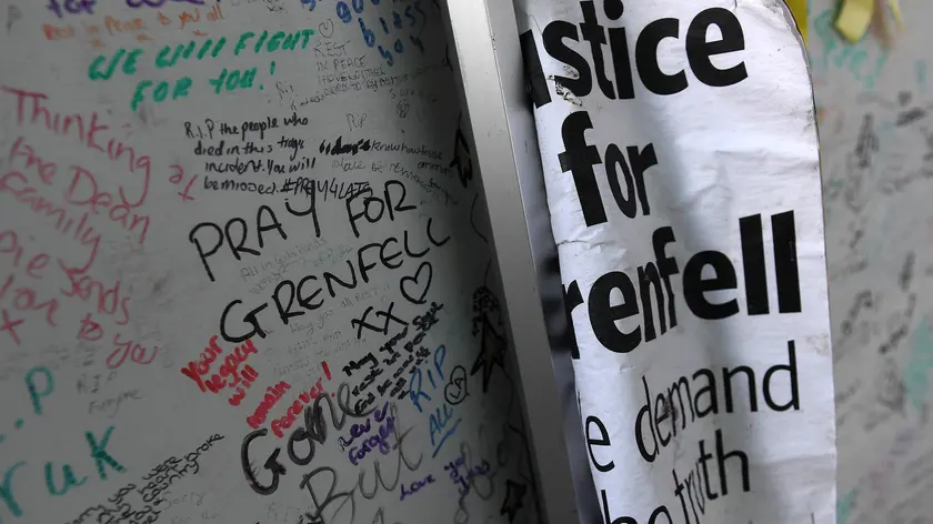 epa06384452 Tributes to Grenfell Tower residents in west London, Britain, 12 December 2017. Grenfell Tower block residents are to mark six months anniversary of the fire with a memorial service at St.Paul's Cathedral on 14 December. Some 79 people are either dead or missing in the fire that broke out at Grenfell Tower on 14 June 2017. EPA/ANDY RAIN