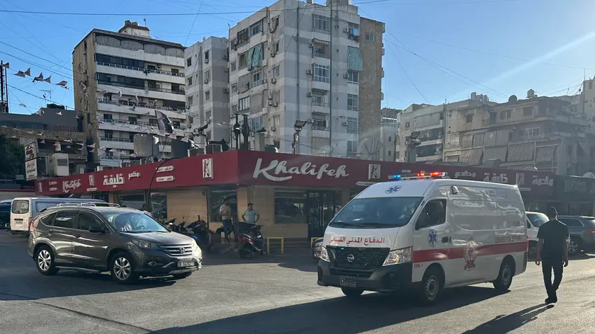 epa11609839 An ambulance moves along the road after an incident involving Hezbollah members’ wireless devices in Dahieh, Beirut, south Lebanon, 17 September 2024. According to Lebanon’s state news agency, several ‘wireless communication devices (pagers) were detonated using advanced technology.’ Several people with various injuries have been arriving at Lebanese hospitals, according to the Lebanese Public Health Emergency Operations Center of the Ministry of Public Health. EPA/WAEL HAMZEH