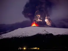 epa08095835 PICTURES OF THE DECADE The Iceland volcano Eyjafjallajokull continues to erupt causing widespread air traffic disruption with clouds of volcanic ash, in Iceland, 19 April 2010. EPA/VILHELM GUNNARSSON *** Local Caption *** 02123870