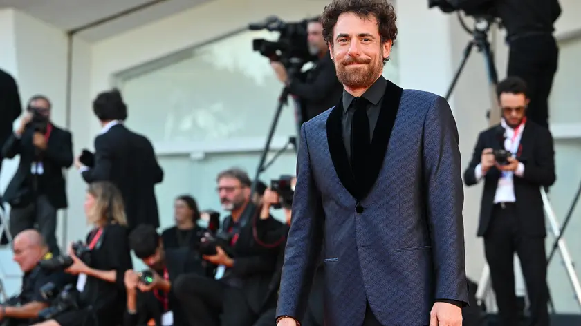 Italian actor Elio Germano arrives for the premiere of 'Il signore delle formiche' during the 79th Venice Film Festival in Venice, Italy, 06 September 2022. The movie is presented in official competition 'Venezia 79' at the festival running from 31 August to 10 September 2022. ANSA/ETTORE FERRARI