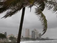 epa10981702 Strong waves on the boardwalk in Santo Domingo, Dominican Republic, 17 November 2023. A good part of the country (19 provinces) is on maximum alert due to heavy rains announced from 17-19 November due to a potential tropical cyclone, located about 415 kilometers to the west/ southwest of Kingston, Jamaica, EPA/Orlando Barria