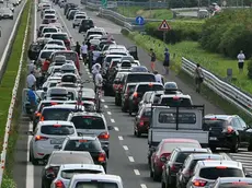 Udine 31 agosto 2013.Autostrada A 4 Bollino Rosso..Chiuso l'ingresso Udine SUD direzione Trieste..Nella foto la coda dell'autostrada A23 dir Sud vista dal cavalcavia di via Rinaldo Cogolo, Terenzano..© Foto Petrussi Foto Press / Ferraro Simone