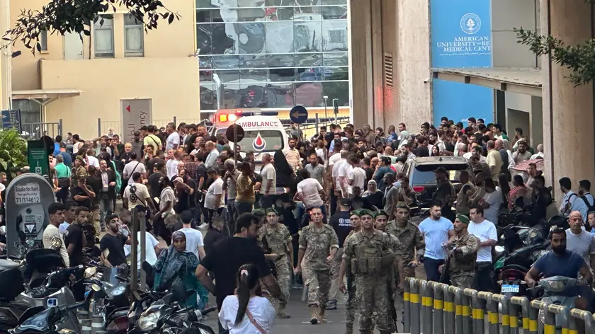epaselect epa11609842 Lebanese soldiers and Hezbollah members gather outside a hospital where injured people were being transported, following an incident involving Hezbollah members’ wireless devices in Dahieh, Beirut, south Lebanon, 17 September 2024. According to Lebanon’s state news agency, several ‘wireless communication devices (pagers) were detonated using advanced technology.’ Several people with various injuries have been arriving at Lebanese hospitals, according to the Lebanese Public Health Emergency Operations Center of the Ministry of Public Health. EPA/WAEL HAMZEH