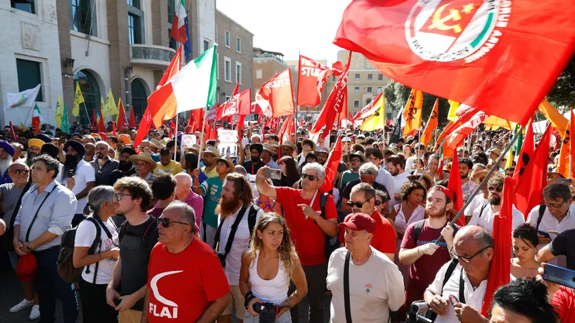 epa11431027 Participants attend a demonstration for late Satnam Singh in Latina, Italy, 22 June 2024. Satnam Singh, a 31-year-old Indian migrant laborer died after being abandoned by the owner of the farm where he had lost his right arm in an accident at work on 17 June. EPA/STRINGER