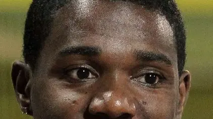 Justin Gatlin, of the United States, gives a thumbs up after finishing second in the men's 100 meters race, at the Rovereto Athletics meeting, in Rovereto, Italy, Tuesday, Aug. 31, 2010. (AP Photo/Felice Calabro')