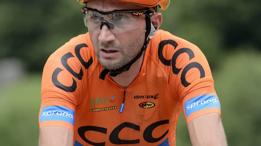 epa04801305 Italian rider Davide Rebellin of team CCC Sprandi Polkowice warms up before the 3rd stage, a 117.3 km race from Quinto to Olivone, at the 79th Tour de Suisse UCI ProTour cycling race, in Olivone, Switzerland, 15 June 2015. EPA/JEAN-CHRISTOPHE BOTT
