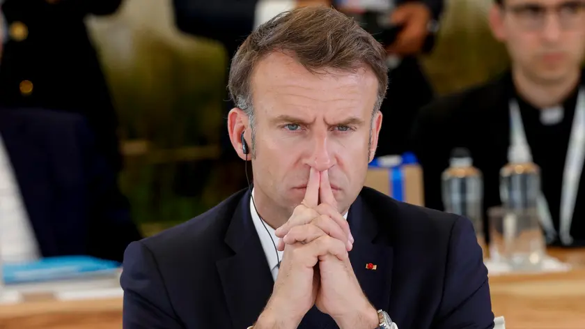 epa11410022 French President Emmanuel Macron attends 'Session VI: Artificial intelligence, energy, Africa-Mediterranean' on the second day of the G7 summit, in Borgo Egnazia, Apulia region, southern Italy, 14 June 2024. The 50th G7 Summit brings together the Group of Seven member states leaders in Borgo Egnazia resort from 13 to 15 June 2024. EPA/GIUSEPPE LAMI