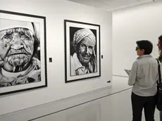 epa04445315 Visitors look at artworks of the exhibition '19142014: 100 Years of Creation' by Moroccan artists in the new 'Mohammed VI Museum of Modern and Contemporary Art' (MMVI) in Rabat, Morocco, 13 October 2014. The MMVI is the first contemporary art museum in Morocco and was inaugurated by Moroccan King Mohammed VI on 07 October. EPA/ABDELHAK SENNA