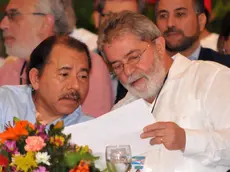 epa02742754 Brazilian former president Luiz Inacio Lula da Silva (R) talks to Nicaraguan President Daniel Ortega (L) during the 17th Forum of Sao Paulo in Managua, Nicaragua, 19 May 2011. The event is centered on international affairs such as the definitive solution of Honduran crisis and the rebellions in Arab countries. EPA/MARIO LOPEZ