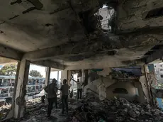 epa11392750 Palestinians inspect a destroyed UNRWA school following an Israeli air strike in Al Nusairat refugee camp in the central Gaza Strip, 06 June 2024. According to the Palestinian News Agency Wafa, at least 32 people were killed and dozens others were injured on early 06 June following an Israeli strike on a UNRWA school sheltering displaced Palestinians, located in the Nuseirat refugee camp in the central Gaza strip. The Israeli army said that it had "conducted a precise strike on a Hamas compound", whose members were " embedded in the UNRWA school". More than 36,000 Palestinians and over 1,400 Israelis have been killed, according to the Palestinian Health Ministry and the Israel Defense Forces (IDF), since Hamas militants launched an attack against Israel from the Gaza Strip on 07 October 2023, and the Israeli operations in Gaza and the West Bank which followed it. EPA/MOHAMMED SABER