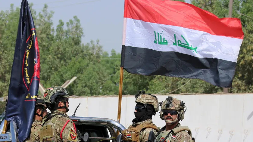 epa10051624 Members of the Iraqi Emergency Response Division (ERD) forces march during a graduation ceremony at a military base in western Baghdad, Iraq, 04 July 2022. The Rapid Reaction Forces is one of the Iraqi Special Forces units that were established and trained in 2014 to combat terrorist groups and support the other Iraqi security forces. The US Congress blacklisted the Iraqi Emergency Response Division (ERD) in 2015 and accused that its officers have engaged in human rights abuses. EPA/AHMED JALIL