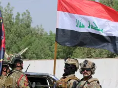 epa10051624 Members of the Iraqi Emergency Response Division (ERD) forces march during a graduation ceremony at a military base in western Baghdad, Iraq, 04 July 2022. The Rapid Reaction Forces is one of the Iraqi Special Forces units that were established and trained in 2014 to combat terrorist groups and support the other Iraqi security forces. The US Congress blacklisted the Iraqi Emergency Response Division (ERD) in 2015 and accused that its officers have engaged in human rights abuses. EPA/AHMED JALIL