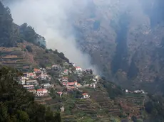 epa11554213 General view of a fire in Madeira Island, Portugal, 18 August 2024. The fire, which started on 14 August in the municipality of Ribeira Brava and spread the following day to the neighboring municipality of Camara de Lobos, is now active on three fronts and is being fought by 120 operational, 43 vehicles and one aircraft, with the region having the support of 76 members of the joint force of the National Emergency and Civil Protection Authority. EPA/HOMEM DE GOUVEIA