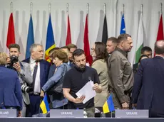 epaselect epa11415643 President Volodymyr Zelensky of Ukraine (C) holds sheets of paper at the plenary session of the Summit on Peace in Ukraine in Stansstad near Lucerne, Switzerland, 16 June 2024. International heads of state gathered on 15 and 16 June at the Buergenstock Resort in central Switzerland for the two-day Summit on Peace in Ukraine. EPA/URS FLUEELER / POOL EDITORIAL USE ONLY EDITORIAL USE ONLY