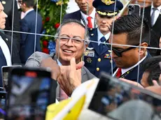 epa11407838 Colombian President Gustavo Petro Urrego (C) greets onlookers behind a fence as he arrives at the Colombian navy's flagship 'ARC Gloria', which is docked at the Skeppsbron during the Colombian president's visit to Sweden, to meet with Sweden's Prime Minister Ulf Kristersson (unseen) in Stockholm, 13 June 2024. The Colombian President is on an official visit in Sweden from 11 to 14 June on the occasion of marking the 150th anniversary of bilateral relations between the two countries. The visit is focussed on 'bilateral relations, multilateral issues, the peace process in Colombia, sustainable development, research and innovations and economic cooperation', the Swedish Parliament says on its website. EPA/Anders Wiklund SWEDEN OUT