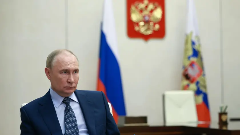 epa11474194 Russian President Vladimir Putin listens to Zaporozhye Region Governor Yevgeny Balitsky, during their meeting at the Novo-Ogaryovo state residence, outside Moscow, Russia, 12 July 2024. EPA/VYACHESLAV PROKOFYEV / SPUTNIK / KREMLIN POOL MANDATORY CREDIT
