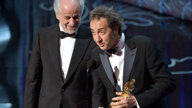 Toni Servillo, left, and Paolo Sorrentino accept the award for best foreign language film of the year for “The Great Beauty” during the Oscars at the Dolby Theatre on Sunday, March 2, 2014, in Los Angeles. (Photo by John Shearer/Invision/AP)