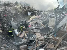 epa11236123 A handout photo made available by the State Emergency Service shows rescuers at work at the scene of a missile strike in the city of Khmelnytskyi, Ukraine, 22 March 2024, amid the Russian invasion. At least two people were killed and eight others were injured in Khmelnytskyi, the State emergency Service reported. According to the Air Force Command of the Armed Forces of Ukraine, Russia has launched projectiles against over 151 targets across Ukraine. The Ukrainian army intercepted 92 of them. EPA/STATE EMERGENCY SERVICE HANDOUT HANDOUT EDITORIAL USE ONLY/NO SALES HANDOUT EDITORIAL USE ONLY/NO SALES