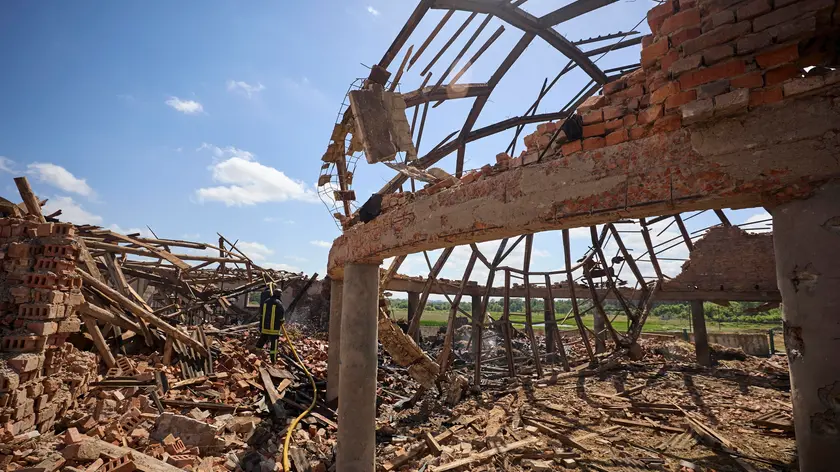 epa11379751 Ukrainian rescuers work at a site of a rocket hit to the riding hall of the Equestrian Center of the Veterinary Academy in Mala Danylivka village near Kharkiv, Ukraine, 30 May 2024 amid the Russian invasion. The Kharkiv Veterinary Academy was founded in 1804 and its Equestrian Center is a historical building. Nobody was killed or injured during the attack according to the report of the head of the Kharkiv Military Administration Oleg Synegubov. Russian troops entered Ukrainian territory on 24 February 2022, starting a conflict that has provoked destruction and a humanitarian crisis. EPA/SERGEY KOZLOV