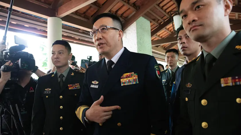 epa11380990 China's Minister of National Defense Admiral Dong Jun (C) speaks to the media after a meeting with US Defence Secretary Lloyd Austin (not pictured), on the sidelines of the Shanghai-la Dialogue Defence Summit in Singapore, 31 May 2024. The US and China defence ministers held the first in-person meeting of this level since late 2022 on the sidelines of the 21st Shanghai-la Dialogue defence summit in Singapore. EPA/HOW HWEE YOUNG