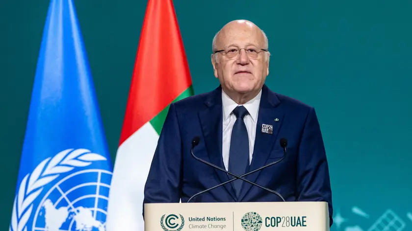epa11006926 Najib Mikati, Prime Minister of Lebanon, speaks during the UN Climate Change Conference COP28, in Dubai, United Arab Emirates, 02 December 2023. The 2023 United Nations Climate Change Conference (COP28), runs from 30 November to 12 December, and is expected to host one of the largest number of participants in the annual global climate conference as over 70,000 estimated attendees, including the member states of the UN Framework Convention on Climate Change (UNFCCC), business leaders, young people, climate scientists, Indigenous Peoples and other relevant stakeholders will attend. EPA/MARTIN DIVISEK