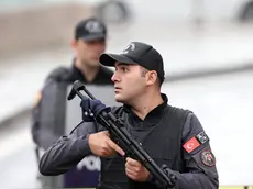 epa10893369 Turkish police officers secure the site of an attack near the Interior Ministry in Ankara, Turkey, 01 October 2023. According to the Turkish Minister of Interior Ali Yerlikaya, two police officers were injured when two people carried a bomb attack outside the ministry's gate, adding that one of the attackers blew himself up and the other was 'neutralized' by security forces. The ministry is located close to the Turkish parliament which was due to reopen on 01 October with a speech by Turkey's President Recep Tayyip Erdogan. EPA/NECATI SAVAS