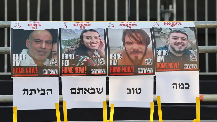 epa11398051 Portraits of released hostages at the hostages square in Tel Aviv, Israel, 08 June 2024. Israeli Special Forces successfully rescued Noa Argamani, Andrey Kozlov, Almog Meir Jan, and Shlomi Ziv from Hamas captivity during a rescue operation in Nuseirat, Gaza Strip, the IDF announced 08 June 2024. The hostages have been transferred to the Tel HaShomer Hospital, the IDF said. EPA/ABIR SULTAN
