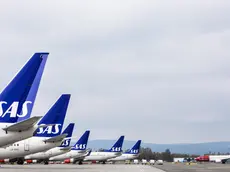epa07529646 SAS airplanes on a tarmac at the Oslo Gardermoen airport during SAS Scandinavian airlines pilots strike in Oslo, Norway, 26 April 2019. Hundreds of SAS Scandinavian airlines pilots from Norway, Sweden and Denmark went on strike after talks on wage failed. According to reports, some 170,000 travellers can be affected with cancelled or delayed flights during the weekend. EPA/OLE BERG RUSTEN NORWAY OUT