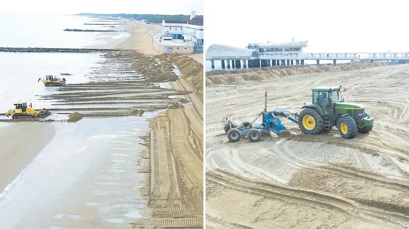 Ruspe e trattori al lavoro sulla spiaggia di Lignano (foto Petrussi)