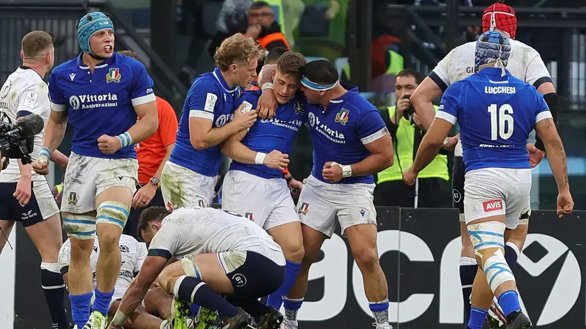 Stephen Varney of Italy celebrates with his teammates after scoring during the Six Nations rugby match between Italy and Scotland at Olimpico stadium in Rome, Italy, 09 March 2024. ANSA/FEDERICO PROIETTI