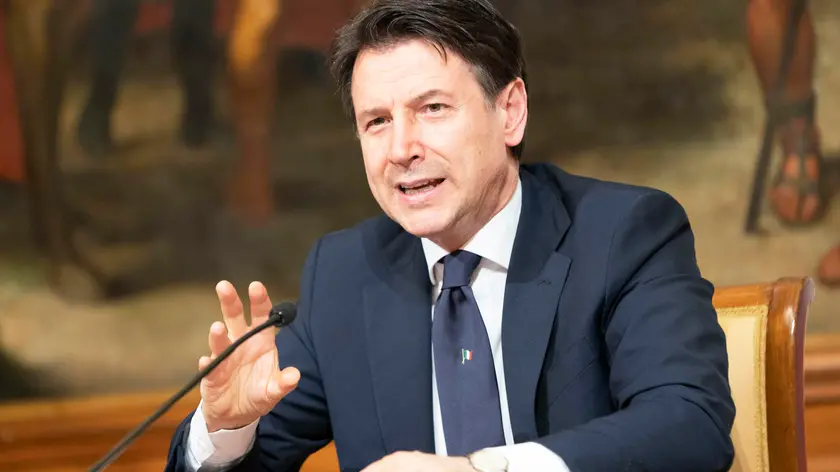 A handout picture made available by the Chigi Palace (Palazzo Chigi) Press Office shows Italian Prime Minister Giuseppe Conte attending the new rules that will be valid for travel and commercial activities from 04 May, in Rome, Italy, 26 April 2020. ANSA/FILIPPO ATTILI/CHIGI PALACE PRESS OFFICE HANDOUT HANDOUT EDITORIAL USE ONLY/NO SALES