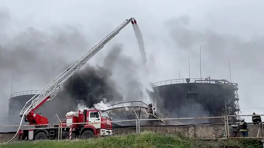 epa10598083 A still image taken from a handout video made available by the Governor of Sevastopol's Telegram channel shows firefighters deployed to extinguish a fire at an oil depot in Sevastopol, Crimea, 29 April 2023. The Governor of Sevastopol confirmed that a fuel tank caught fire in the Sevastopol port area in the morning of 29 April, and that, according to preliminary information, the fire occurred following an unmanned aerial vehicles (UAV) strike. The fire covered an area of ??about 1,000 square meters. No casualties were reported. EPA/SEVASTOPOL GOVERNOR TELEGRAM HANDOUT HANDOUT EDITORIAL USE ONLY/NO SALES HANDOUT EDITORIAL USE ONLY/NO SALES HANDOUT EDITORIAL USE ONLY/NO SALES