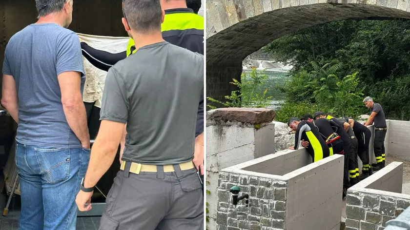 La maglia bianca rinvenuta in una delle griglie della centralina elettrica lungo il Natisone e i vigili del fuoco impegnati nelle ricerche