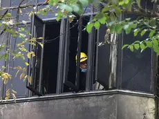 epa11078630 The aftermath of a house fire in Hanoi, Vietnam, 15 January 2024. Four people died in a fire which broke out in the early morning in their house at Hang Luoc street in Hanoi on 15 January. EPA/LUONG THAI LINH