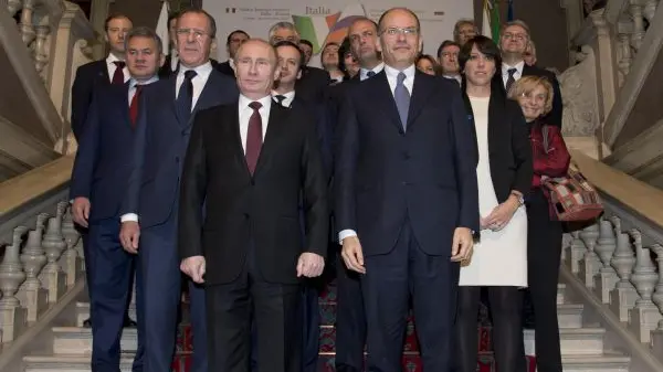 Italian Prime Minister, Enrico Letta (R), with Russian President Vladimir Putin after a summit in Trieste, Italy, 26 November 2013. ANSA/DANIEL DAL ZENNARO