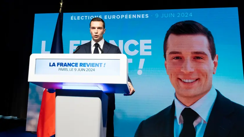 epa11400655 National Rally leader Jordan Bardella delivers a speech at the electoral party of the French right-wing party National Rally (Rassemblement National or RN) in Paris, France, 09 June 2024, after the first results of the European elections. The list of the Rassemblement National, led by party chief Jordan Bardella, is given winner in France according to first estimations after polls. EPA/ANDRE PAIN