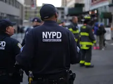 epa10579280 New York City Police Department Couterterrosim Unit officers work the scene of a parking structure collapse in the Financial District of New York City, New York, USA, 18 April 2023. Fire Department officials have reported three injuries but advised they expect that to increase. EPA/JUSTIN LANE