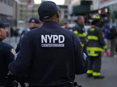 epa10579280 New York City Police Department Couterterrosim Unit officers work the scene of a parking structure collapse in the Financial District of New York City, New York, USA, 18 April 2023. Fire Department officials have reported three injuries but advised they expect that to increase. EPA/JUSTIN LANE