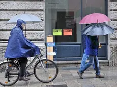 Udine 5 Aprile 2012. Negozi chiusi in Via Vittorio Veneto piu' o meno deserta in un giorno di pioggia. Telefoto Copyright Petrussi Foto Press / Diego Petrussi