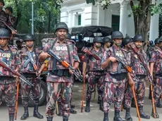 epa11512250 Border Guard Bangladesh (BGB) members stand guard during a 'March for Justice' in front of the Supreme Court area in Dhaka, Bangladesh, 31 July 2024. A nationwide 'March for Justice' was called on 31 July by the Students Against Discrimination group, which has led the quota reform protests, in courts, campuses and on the streets to protest against the 'killings, attacks, and enforced disappearances', and to demand an investigation by the United Nations into the violence that occurred during the student-led protests against the government's job quota system, according to the group's coordinator. EPA/MONIRUL ALAM