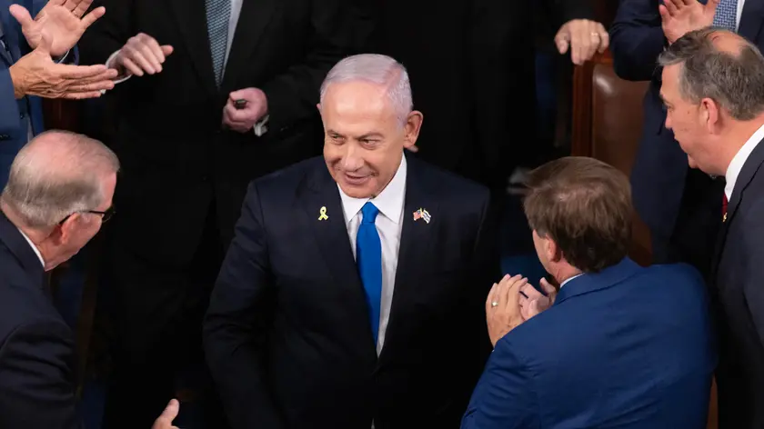 epa11494635 Prime Minister of Israel Benjamin Netanyahu (C) is greeted by lawmakers as he arrives to deliver an address to a joint meeting of Congress in the chamber of the US House of Representatives on Capitol Hill in Washington, DC, USA, 24 July 2024. Netanyahu's address to a joint meeting of the US Congress comes amid a close 2024 US presidential election cycle. Thousands of pro-Palestinian protesters were expected to gather near the US Capitol when Netanyahu becomes the first leader to address the US Congress four times. EPA/MICHAEL REYNOLDS